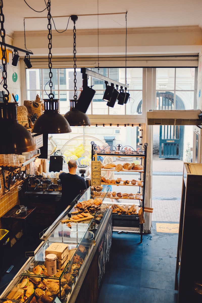 Copper pans and loaves in a light-filled artisan bakehouse