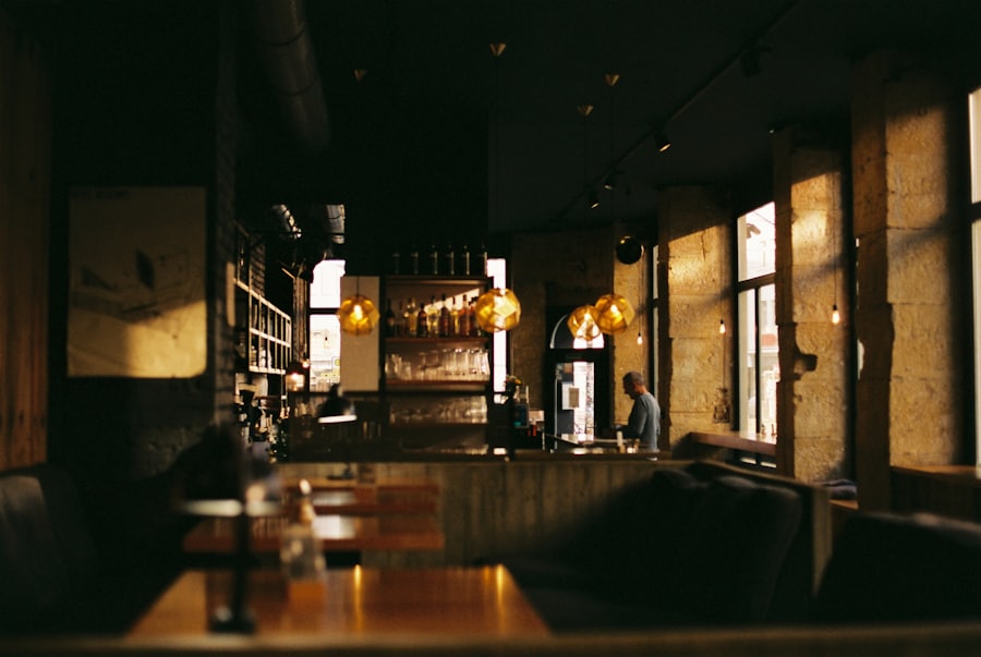 Warm, dimly lit NOIR dining room at night