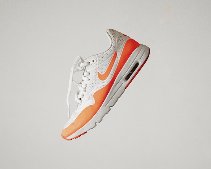VOLTA white and orange Air series running sneaker